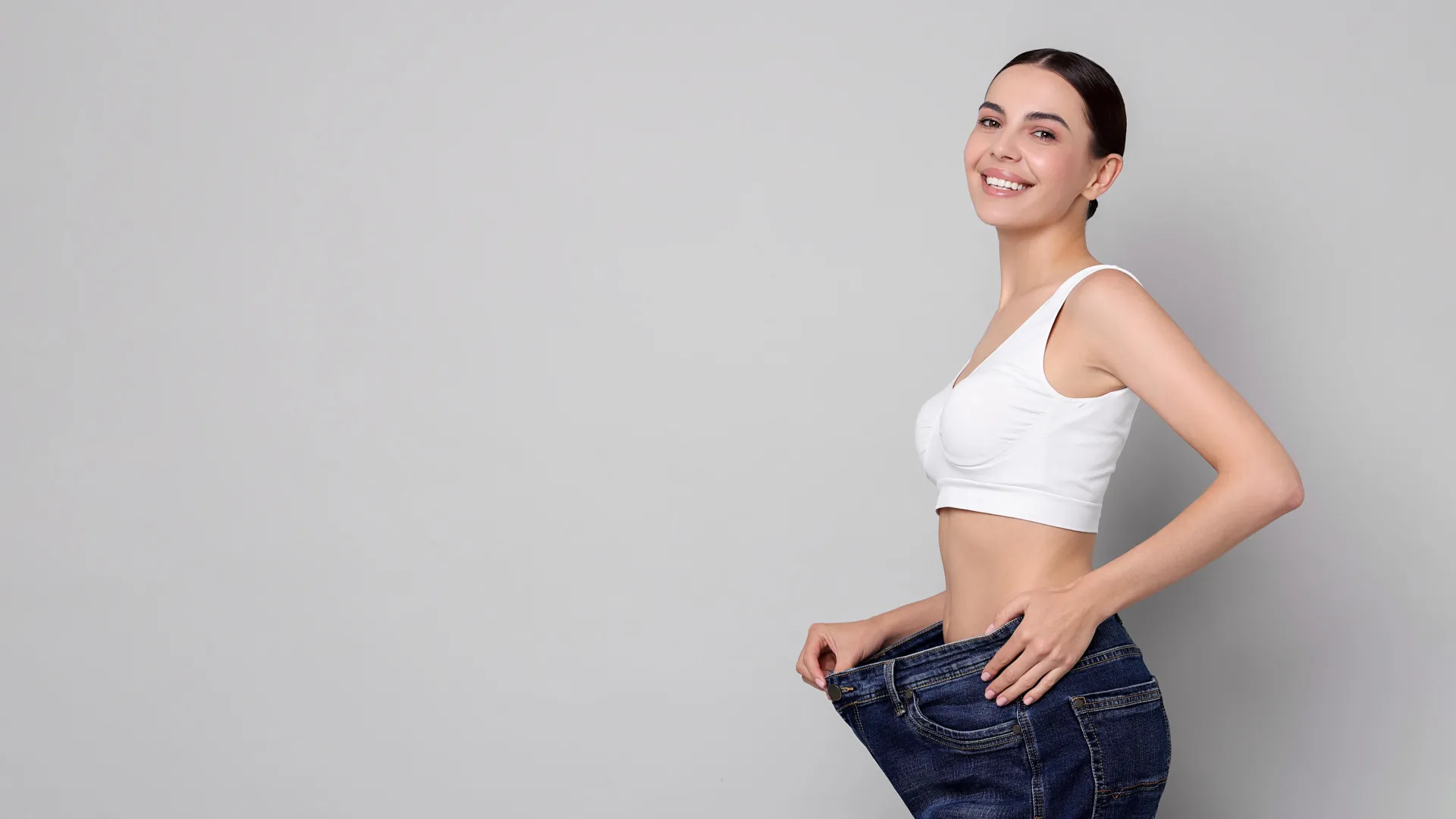 Guest showing medical weight loss results at iCRYO One Loudoun